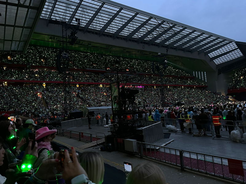 taylor swift gig at anfield 2024 eras tour view fans holding phone torches